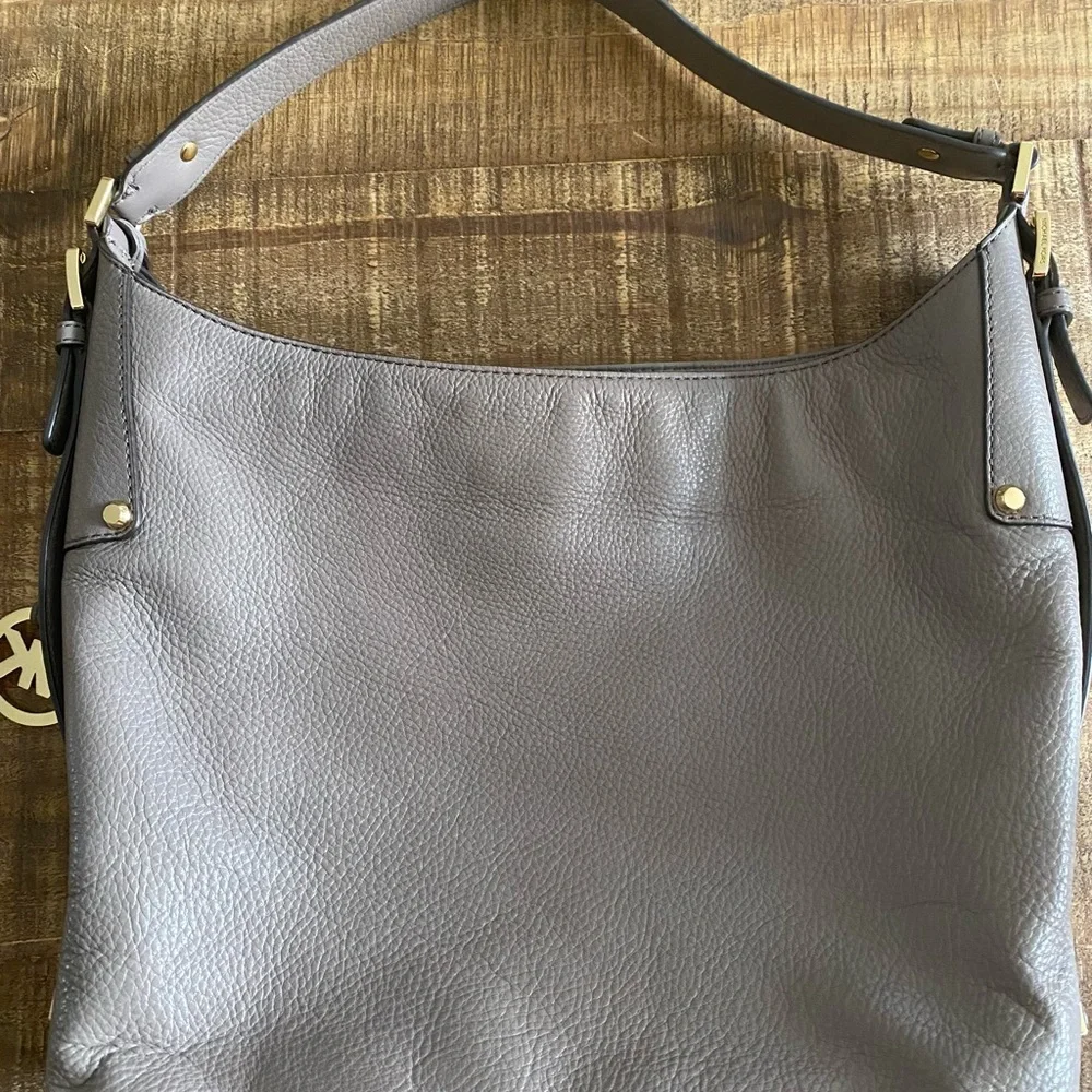 Michael Kors Gray bag. Pre-pwned. Regular wear. Please see pics. - Picture 2 of 4